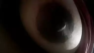 Indian diva lies on back and brings her XXX dark nipples to light