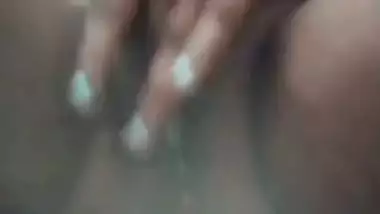 Village girl strips clothes and fingers her pussy heavily